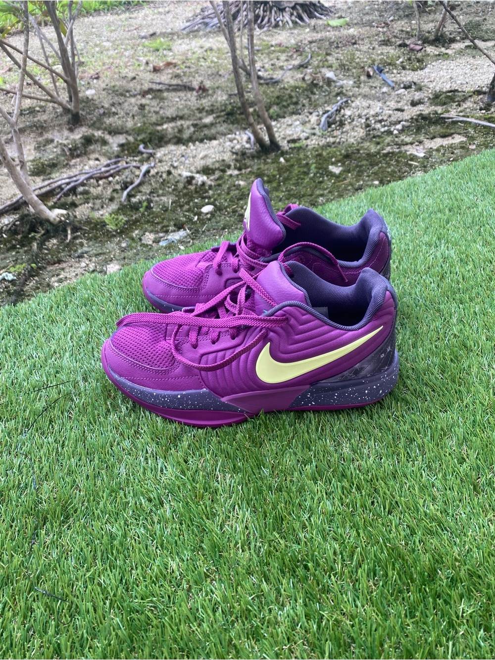 Nike Kids Purple Sneakers with Yellow Swoosh